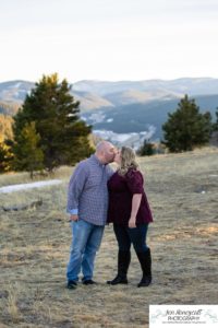 Littleton engagement photographer Mt. Falcon in love husband wife engaged mr. and mrs. mountains Colorado April wedding future marriage married diamond ring photography sunset