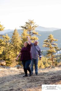 Littleton engagement photographer Mt. Falcon in love husband wife engaged mr. and mrs. mountains Colorado April wedding future marriage married diamond ring photography sunset twirl dance