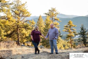 Littleton engagement photographer Mt. Falcon in love husband wife engaged mr. and mrs. mountains Colorado April wedding future marriage married diamond ring photography sunset