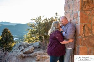 Littleton engagement photographer Mt. Falcon in love husband wife engaged mr. and mrs. mountains Colorado April wedding future marriage married diamond ring photography sunset