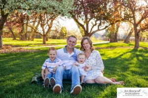 Littleton family photographer pink and white crab apple tree blossoms spring Denver brother sister mother father expecting baby bump little big sunset daughter son mother's day photo session