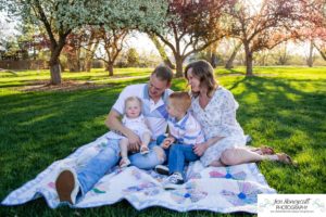 Littleton family photographer pink and white crab apple tree blossoms spring Denver brother sister mother father expecting baby bump little big sunset daughter son mother's day photo session