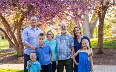 A spring family photo session in the tree blossoms by Littleton photographer