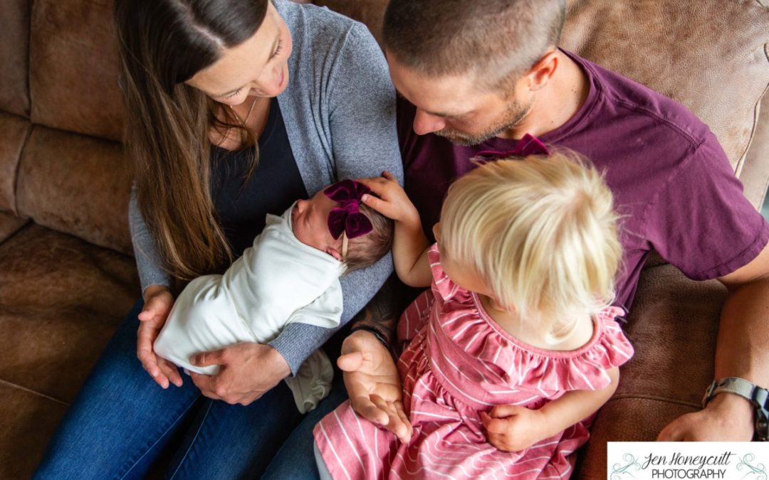 Newborn baby Sydney’s in home lifestyle photo session by Littleton family photographer