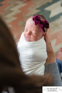 Littleton baby newborn photographer Colorado in home lifestyle sisters mother father daughter natural light connection tiny infant photography