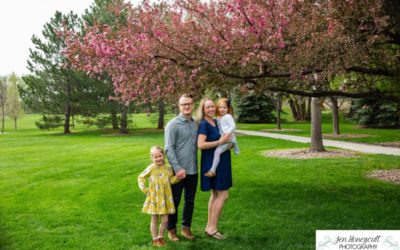 The {W} family of 4 1/2 by local Littleton photographer in the spring tree blossoms