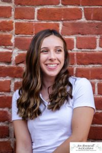 Littleton high school senior photographer Downtown Littleton urban Carson Nature Center sunflowers sunset light Platte River water Front Range Christian Class of 2022 basketball player sweet girl