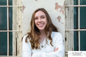 Littleton high school senior photographer Downtown Littleton urban Carson Nature Center sunflowers sunset light Platte River water Front Range Christian Class of 2022 basketball player sweet girl