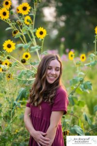 Littleton high school senior photographer Downtown Littleton urban Carson Nature Center sunflowers sunset light Platte River water Front Range Christian Class of 2022 basketball player sweet girl