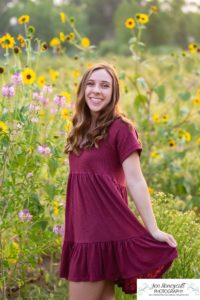 Littleton high school senior photographer Downtown Littleton urban Carson Nature Center sunflowers sunset light Platte River water Front Range Christian Class of 2022 basketball player sweet girl