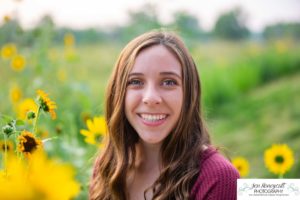 Littleton high school senior photographer Downtown Littleton urban Carson Nature Center sunflowers sunset light Platte River water Front Range Christian Class of 2022 basketball player sweet girl