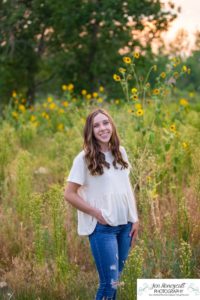 Littleton high school senior photographer Downtown Littleton urban Carson Nature Center sunflowers sunset light Platte River water Front Range Christian Class of 2022 basketball player sweet girl