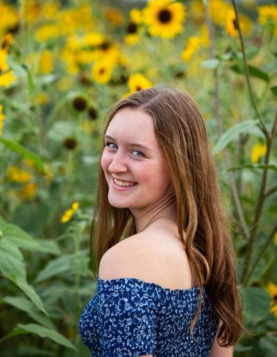 Littleton high school senior photographer Heritage Colorado teen teenager sunflowers summer Class of 2022 sweet fun sunset photo session