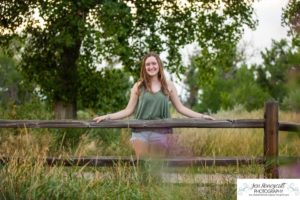 Littleton high school senior photographer Heritage cross country Writer's Vista park Carson Nature Center sunflowers lovely girl sunset light bridge friend