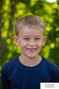 Littleton family photographer at Writer's Vista park in Colorado boy brothers bridge new client fun morning natural light leaves yellow trees