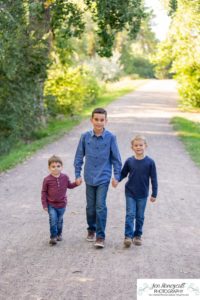 Littleton family photographer at Writer's Vista park in Colorado boy brothers bridge new client fun morning natural light leaves yellow trees