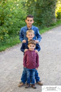 Littleton family photographer at Writer's Vista park in Colorado boy brothers bridge new client fun morning natural light leaves yellow trees