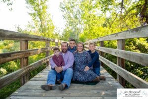 Littleton family photographer at Writer's Vista park in Colorado boy brothers bridge new client fun morning natural light leaves yellow trees