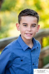 Littleton family photographer at Writer's Vista park in Colorado boy brothers bridge new client fun morning natural light leaves yellow trees