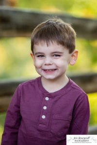 Littleton family photographer at Writer's Vista park in Colorado boy brothers bridge new client fun morning natural light leaves yellow trees