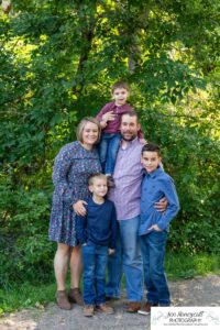 Littleton family photographer at Writer's Vista park in Colorado boy brothers bridge new client fun morning natural light leaves yellow trees