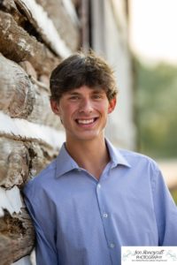 Littleton high school senior photographer in Colorado Chatfield Class of 2022 basketball player smart boy Hildebrand Ranch sunset fall photo session