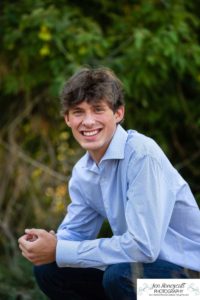 Littleton high school senior photographer in Colorado Chatfield Class of 2022 basketball player smart boy Hildebrand Ranch sunset fall photo session