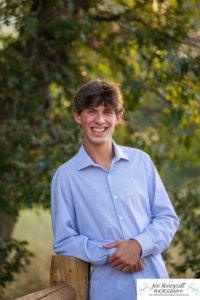 Littleton high school senior photographer in Colorado Chatfield Class of 2022 basketball player smart boy Hildebrand Ranch sunset fall photo session