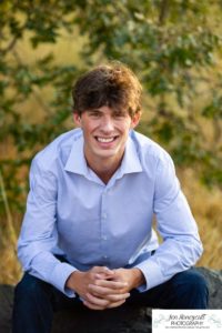 Littleton high school senior photographer in Colorado Chatfield Class of 2022 basketball player smart boy Hildebrand Ranch sunset fall photo session