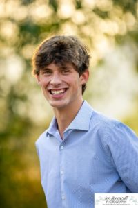 Littleton high school senior photographer in Colorado Chatfield Class of 2022 basketball player smart boy Hildebrand Ranch sunset fall photo session