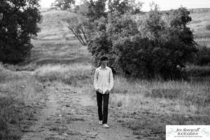 Littleton high school senior photographer in Colorado Chatfield Class of 2022 basketball player smart boy Hildebrand Ranch sunset fall photo session