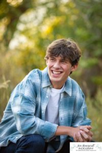 Littleton high school senior photographer in Colorado Chatfield Class of 2022 basketball player smart boy Hildebrand Ranch sunset fall photo session