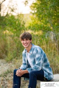 Littleton high school senior photographer in Colorado Chatfield Class of 2022 basketball player smart boy Hildebrand Ranch sunset fall photo session