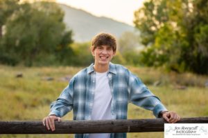 Littleton high school senior photographer in Colorado Chatfield Class of 2022 basketball player smart boy Hildebrand Ranch sunset fall photo session