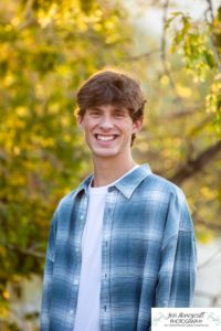 Littleton high school senior photographer in Colorado Chatfield Class of 2022 basketball player smart boy Hildebrand Ranch sunset fall photo session