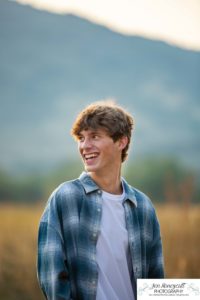 Littleton high school senior photographer in Colorado Chatfield Class of 2022 basketball player smart boy Hildebrand Ranch sunset fall photo session