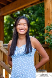 Littleton high school senior photographer Arapahoe Centennial Colorado Carson Nature Center Class of 2022 summer light sunset sunflowers beautiful girl natural light photography