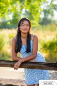 Littleton high school senior photographer Arapahoe Centennial Colorado Carson Nature Center Class of 2022 summer light sunset sunflowers beautiful girl natural light photography