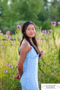 Littleton high school senior photographer Arapahoe Centennial Colorado Carson Nature Center Class of 2022 summer light sunset sunflowers beautiful girl natural light photography