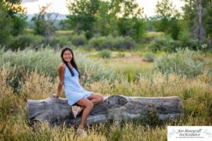 Littleton high school senior photographer Arapahoe Centennial Colorado Carson Nature Center Class of 2022 summer light sunset sunflowers beautiful girl natural light photography