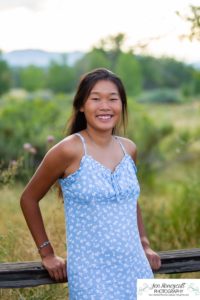 Littleton high school senior photographer Arapahoe Centennial Colorado Carson Nature Center Class of 2022 summer light sunset sunflowers beautiful girl natural light photography