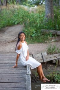 Littleton high school senior photographer Arapahoe Centennial Colorado Carson Nature Center Class of 2022 summer light sunset sunflowers beautiful girl natural light photography