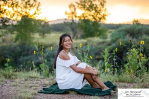 Littleton high school senior photographer Arapahoe Centennial Colorado Carson Nature Center Class of 2022 summer light sunset sunflowers beautiful girl natural light photography