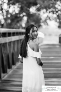 Littleton high school senior photographer Arapahoe Centennial Colorado Carson Nature Center Class of 2022 summer light sunset sunflowers beautiful girl natural light photography