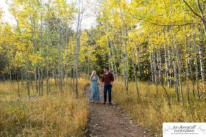 Littleton couple photographer Meyer Ranch Colorado aspen trees yellow leaves proposal engaged engagement photo session proposed future husband and wife dog diamond ring wedding photography