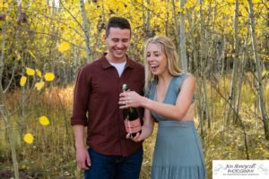 Littleton couple photographer Meyer Ranch Colorado aspen trees yellow leaves proposal engaged engagement photo session proposed future husband and wife dog diamond ring wedding photography