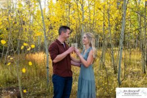 Littleton couple photographer Meyer Ranch Colorado aspen trees yellow leaves proposal engaged engagement photo session proposed future husband and wife dog diamond ring wedding photography