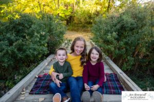 Littleton family photographer Fly'N B park in Highlands Ranch Colorado fall leaves brother sisters sunset photography natural light