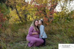 Littleton family and maternity photographer Lair O' the Bear park Morrison Colorado baby bump pregnant pregnancy fall leaves daughter cute kid photography sunset