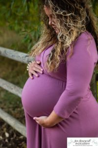 Littleton family and maternity photographer Lair O' the Bear park Morrison Colorado baby bump pregnant pregnancy fall leaves daughter cute kid photography sunset